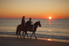 Horseback riding in Panama by the ocean at sunset – Best Places In The World To Retire – International Living
